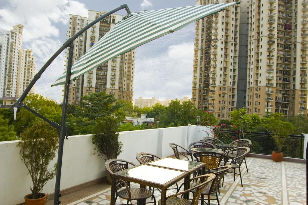 Tree Top Greens Apartment คูร์เคาน์ ภายนอก รูปภาพ